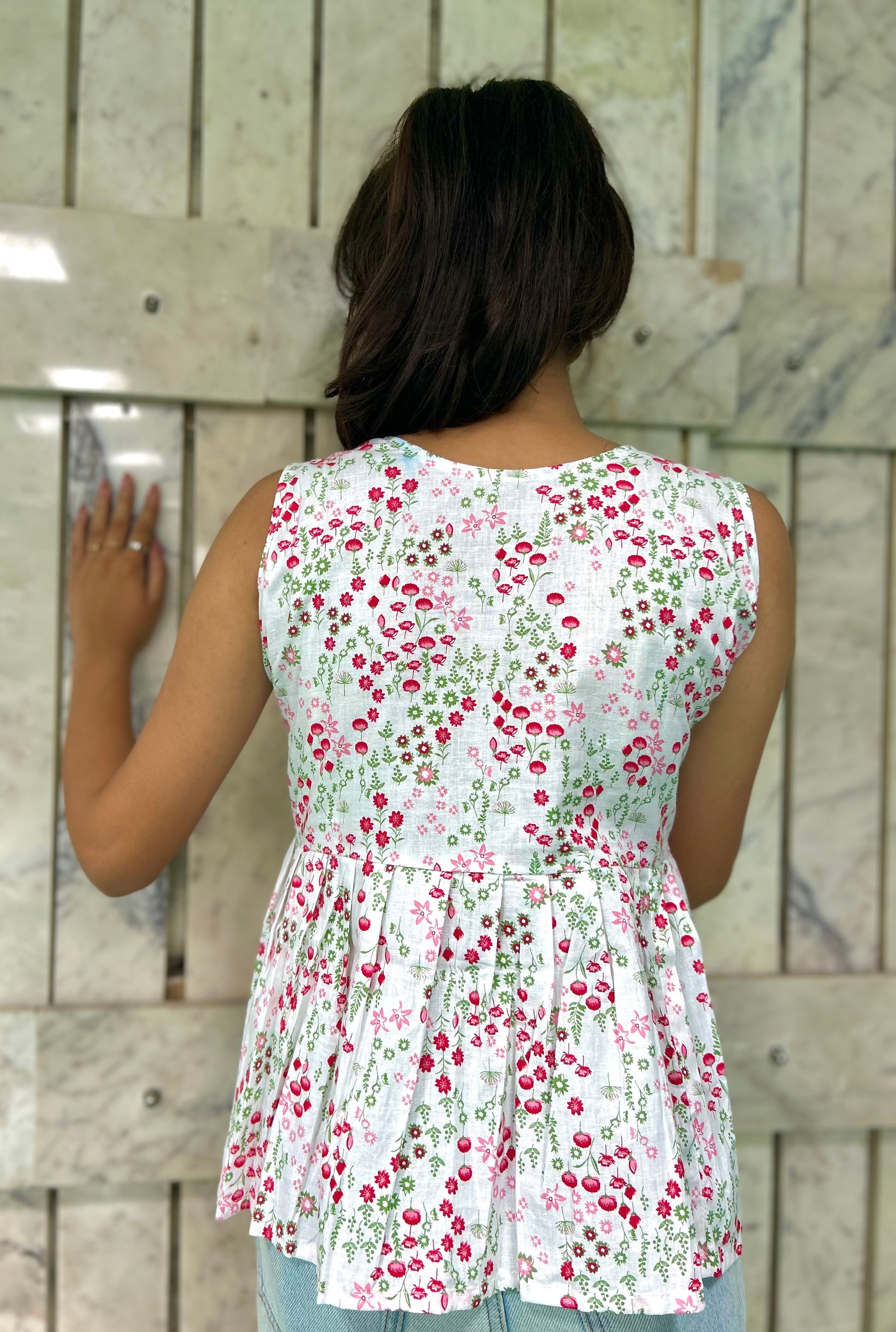 "Oceanic Peplum Top"