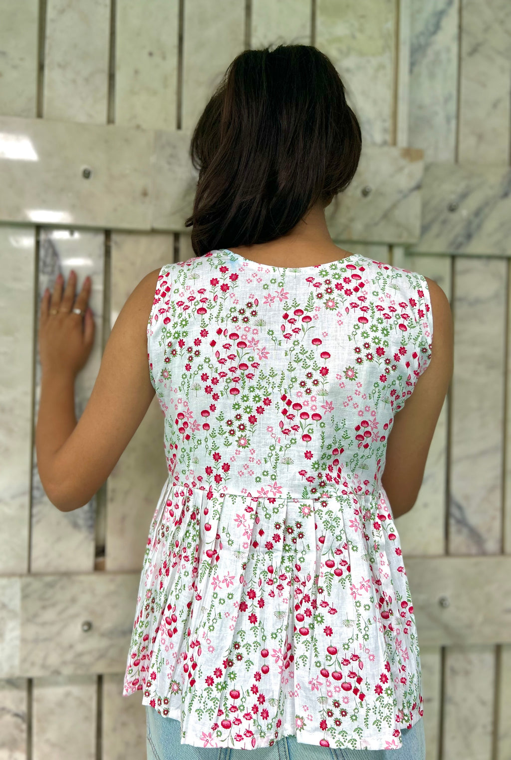 "Oceanic Peplum Top"